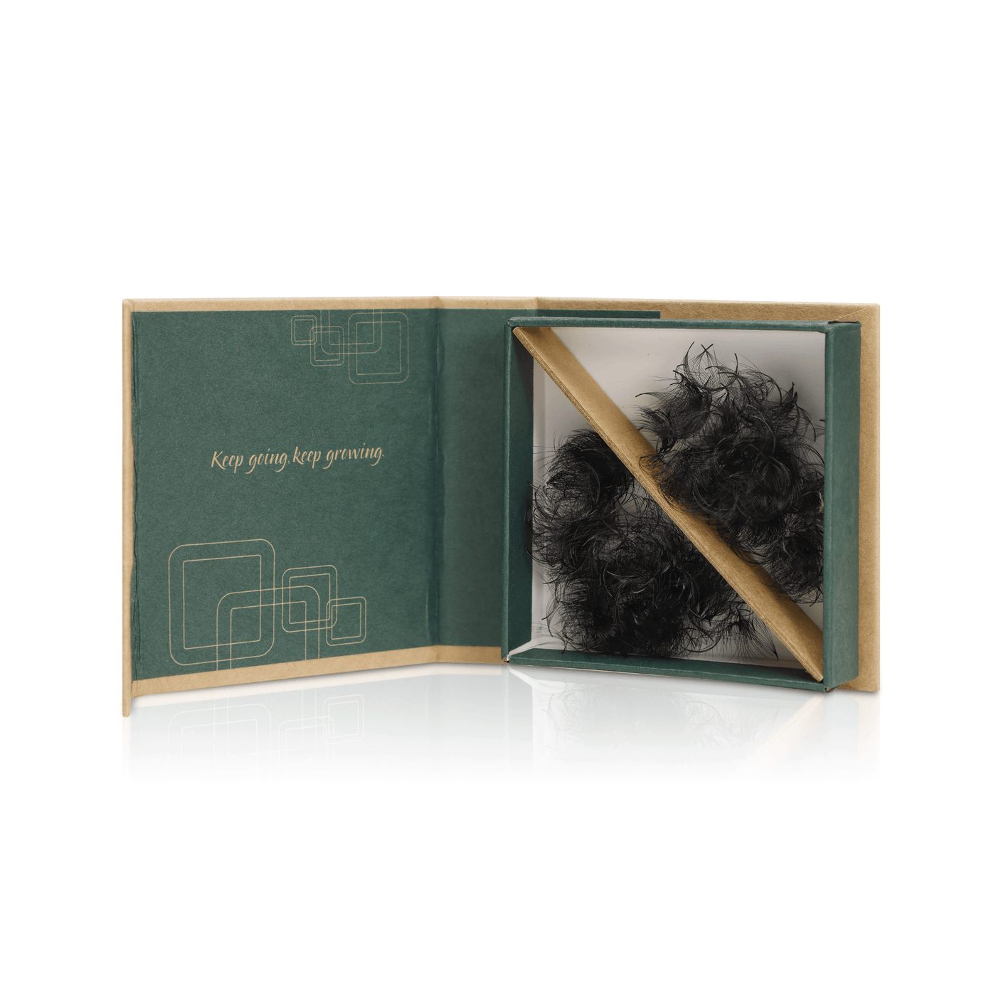 Open box of 16D promade loose eyelash extensions in eco-friendly packaging, featuring soft, fluffy fans crafted from premium Korean PBT. The lashes emphasize high quality, a lightweight design, and commitment to sustainability.